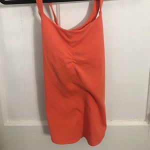 Orange Marmot workout tank with criss-cross back
